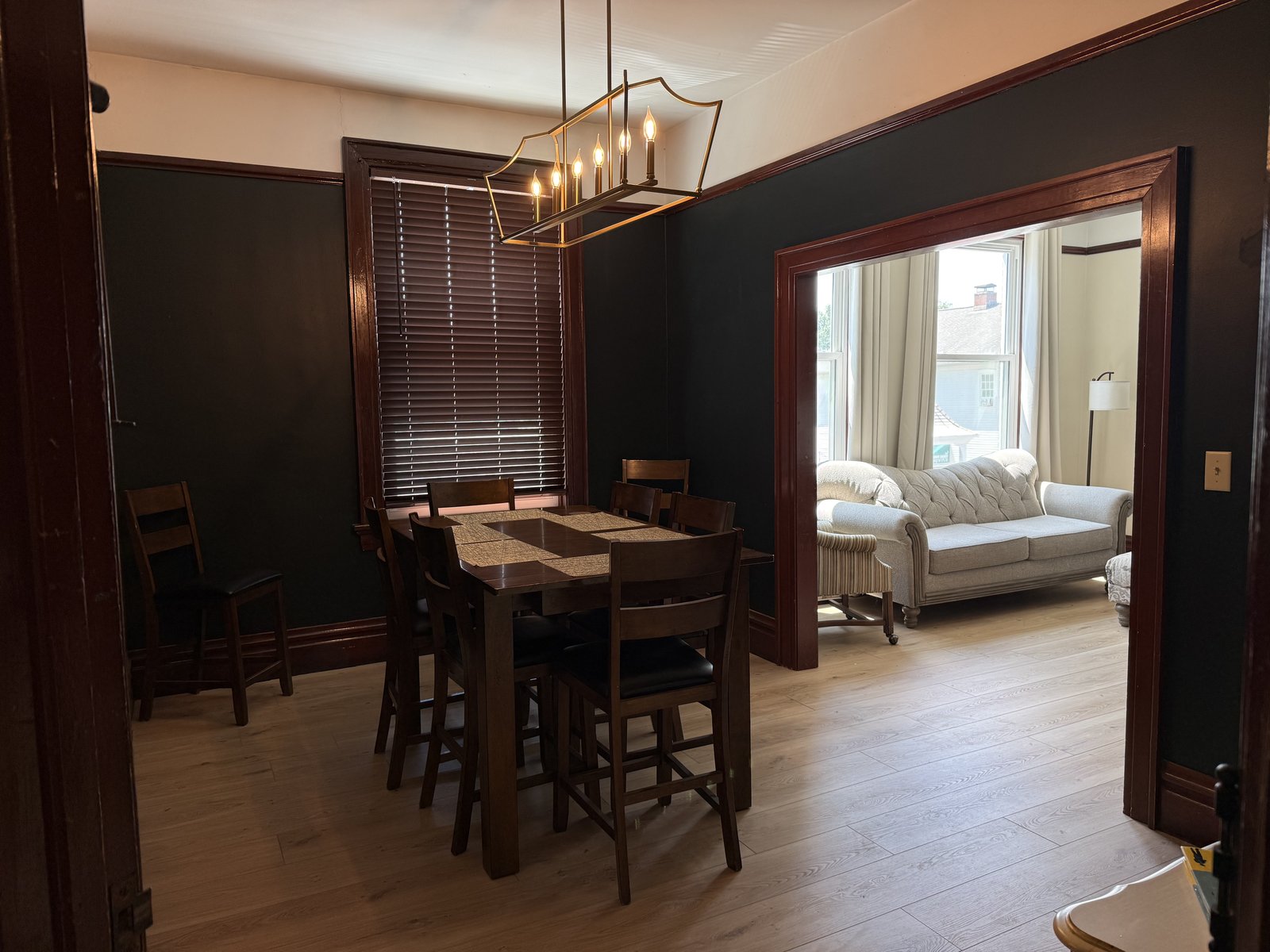 Dining room — view from hallway, table and chandelier